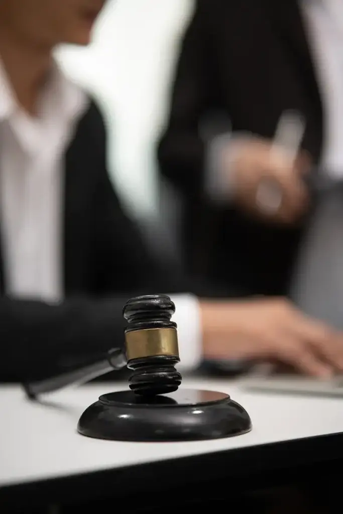 judge gavel with justice lawyers having team concepts of law and