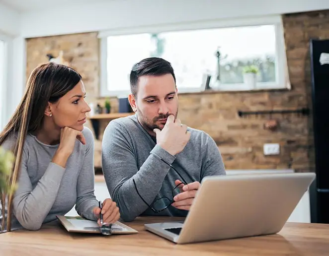couple managing finances.