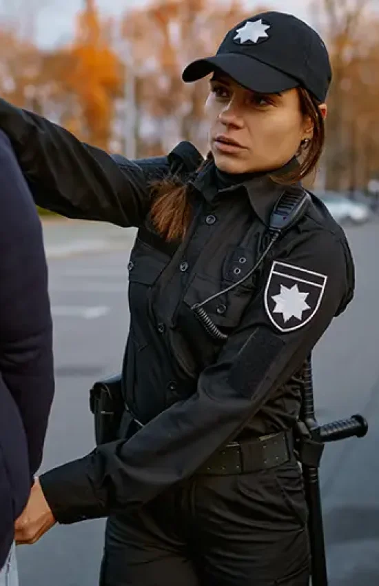 Police officer arresting a person, handled by Lori Beck Law Office for criminal defense in Denver.