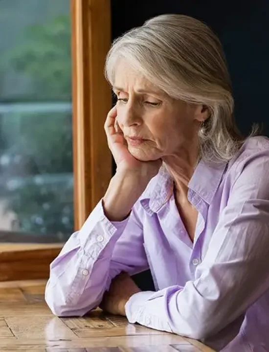 Distressed senior woman; Lori Beck Law Office advocates for elder abuse and neglect victims in Denver, CO.