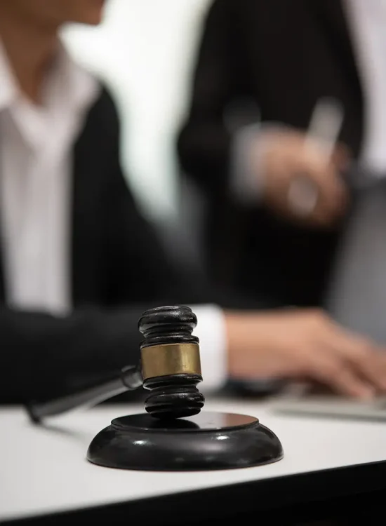 judge gavel with justice lawyers having team concepts of law and