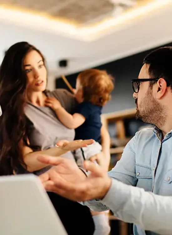 Couple arguing with a baby, symbolizing family distress from criminal charges; Lori Beck Law Office helps families in Denver, CO.